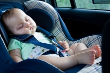 Image of baby sleeping in vehicle
