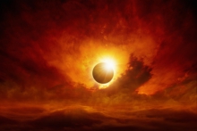 Image of an eclipse with red sky