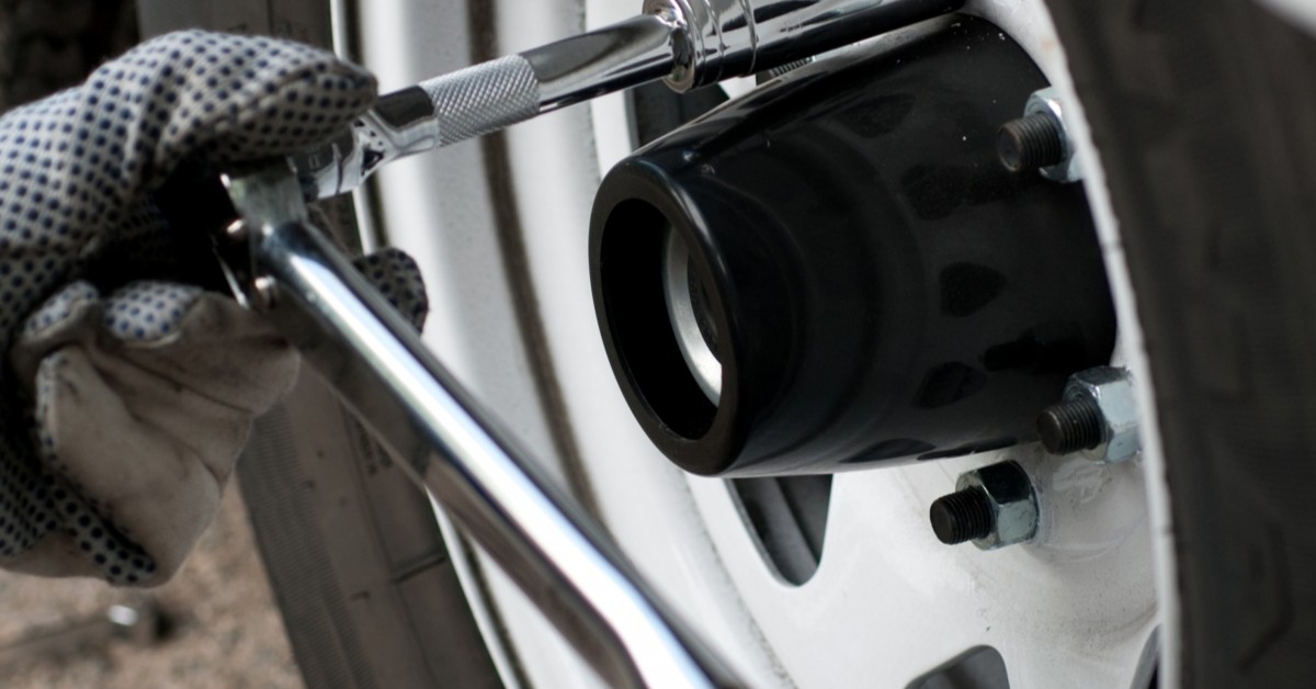 Image Of Tire Being Worked On With Tools