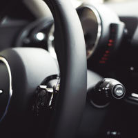 Image of a steering wheel and wiper lever